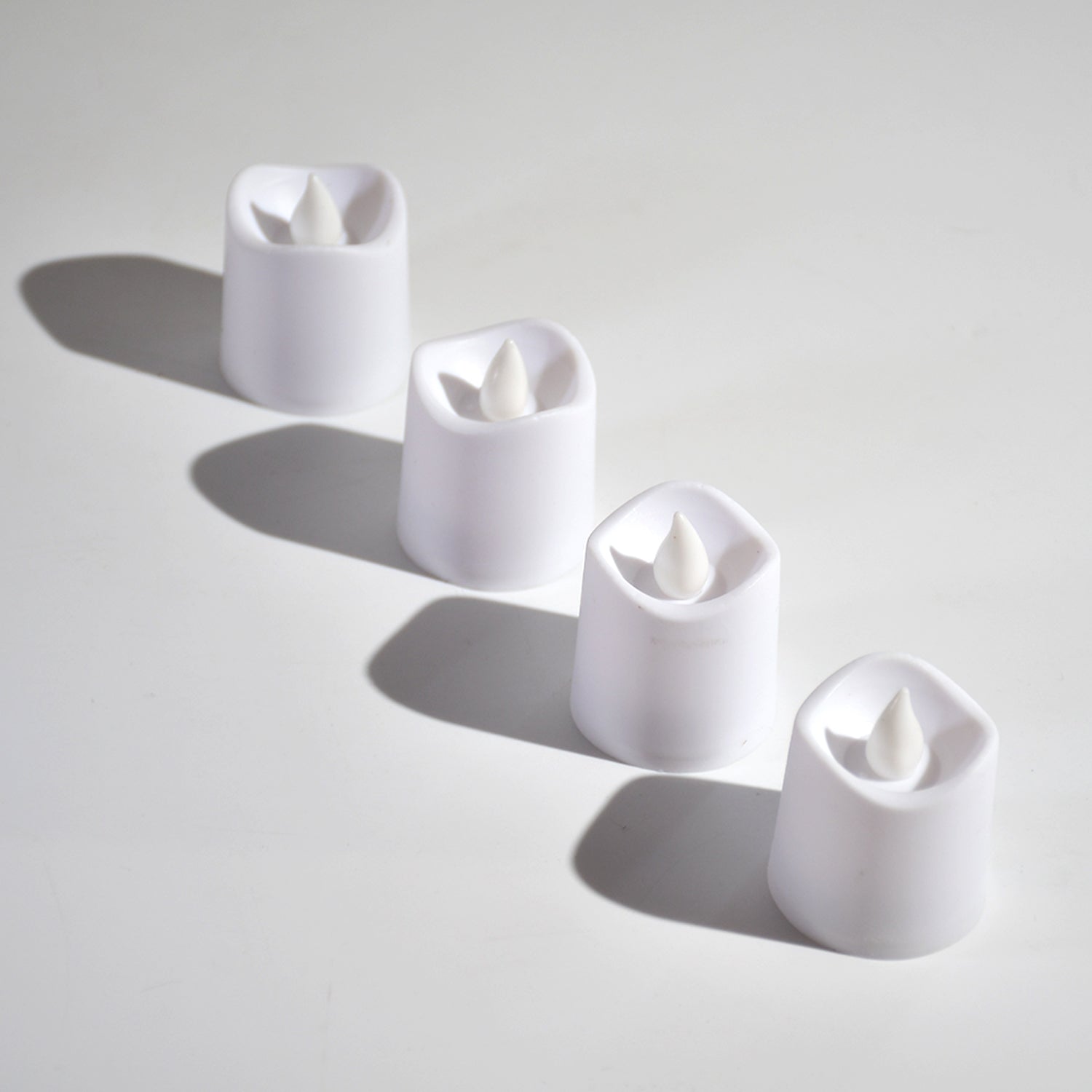 6487 Flameless LED Tealights, Smokeless Plastic Decorative Candles - Led Tea Light Candle For Home Decoration (Pack Of 24) DeoDap 6487 Flameless LED Tealights, Smokeless Plastic Decorative Candles - Led Tea Light Candle For Home Decoration (Pack Of 24) DeoDap